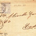 CRCAR117 FRAGMENTO DE CARTA DE REUS A CADIZ CON PAREJA DEL Nº 106B. FECHADOR NEGRO TIPO II.