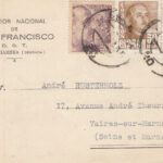 CRCAR228 TARJETA POSTAL DE GRANADA A FRANCIA CON SELLOS 1022 -2- Y 1048. FECHADOR DE GRANADA.