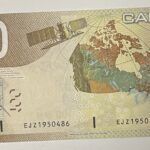 CRBX3352 BILLETE CANADA 100 DOLARES 2004 SERIE EJ P-105 SC