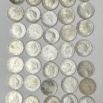 L127  LOTE 53 MONEDAS ANTILLAS HOLANDESAS PLATA DE 0,65